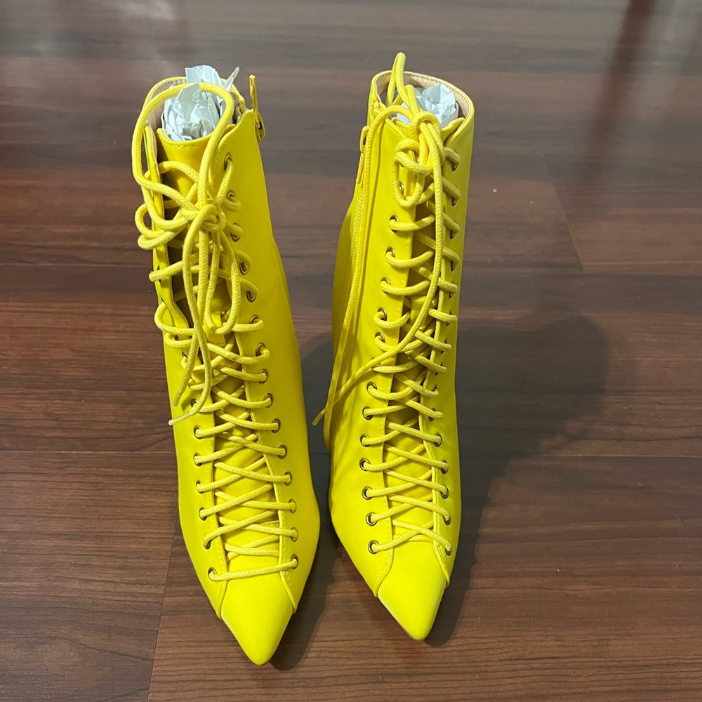 Yellow lace up booties